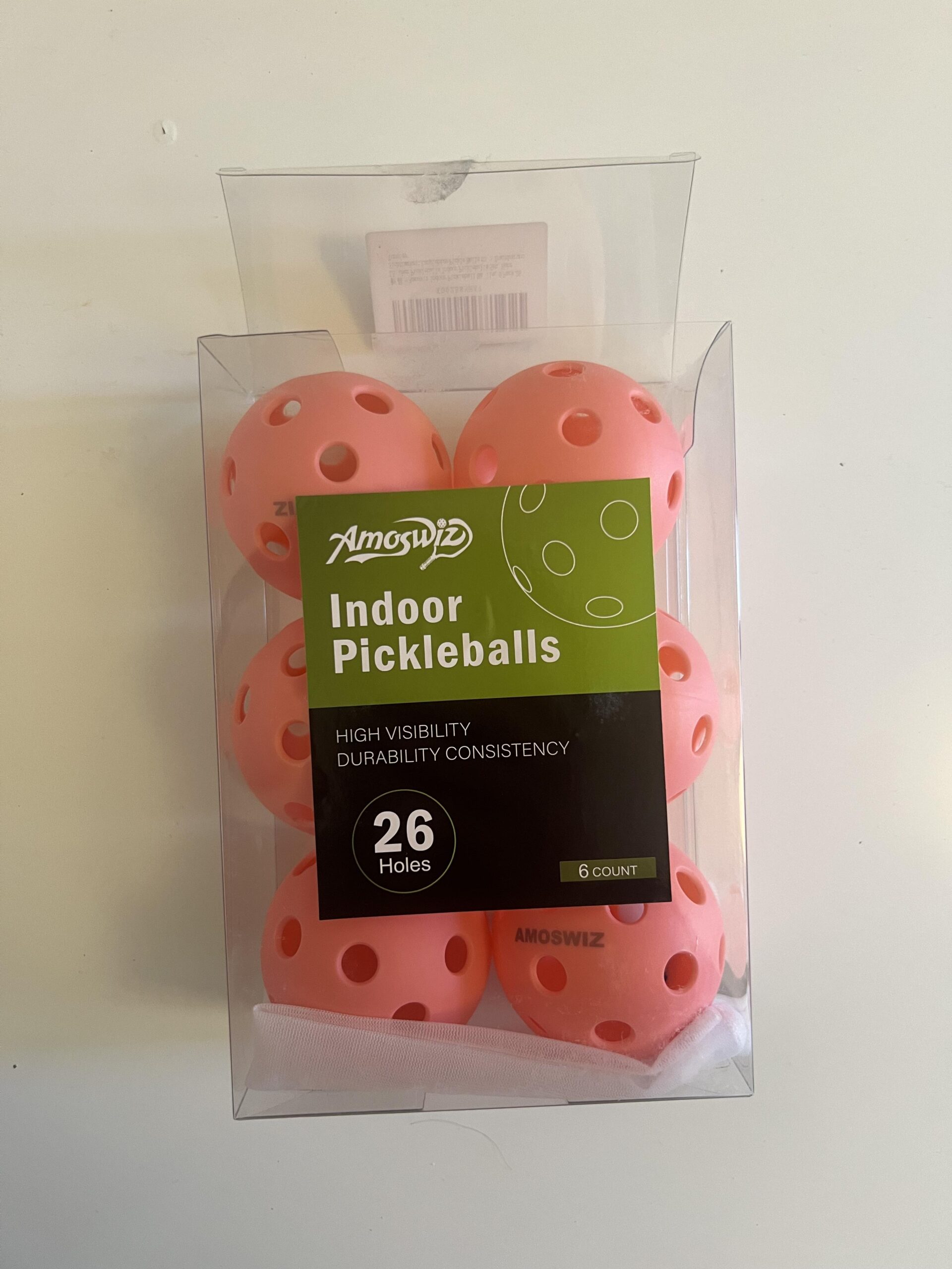 Six pink AMOSWIZ 26-hole indoor pickleballs in the original package