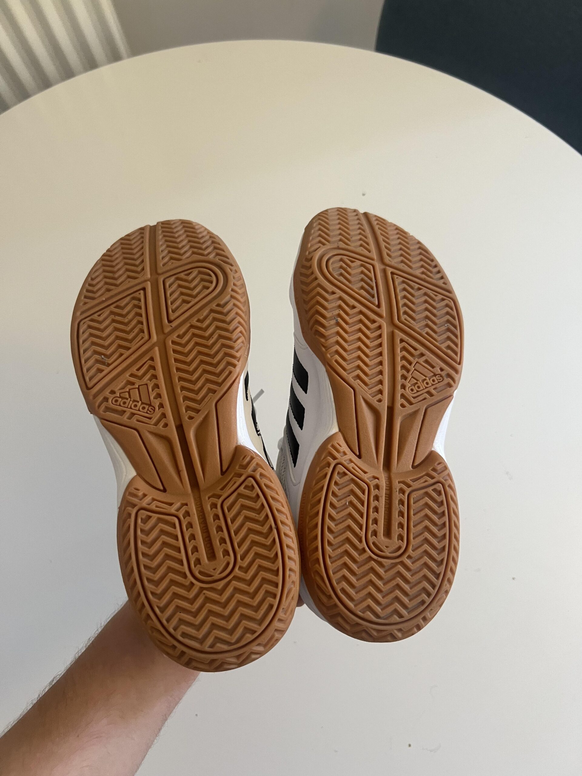 Gum rubber outsole and tread pattern on adidas Speedcourt indoor court shoes