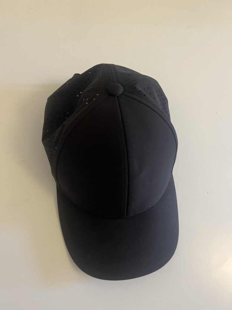 Black AOPREL breathable baseball cap used for pickleball, front view