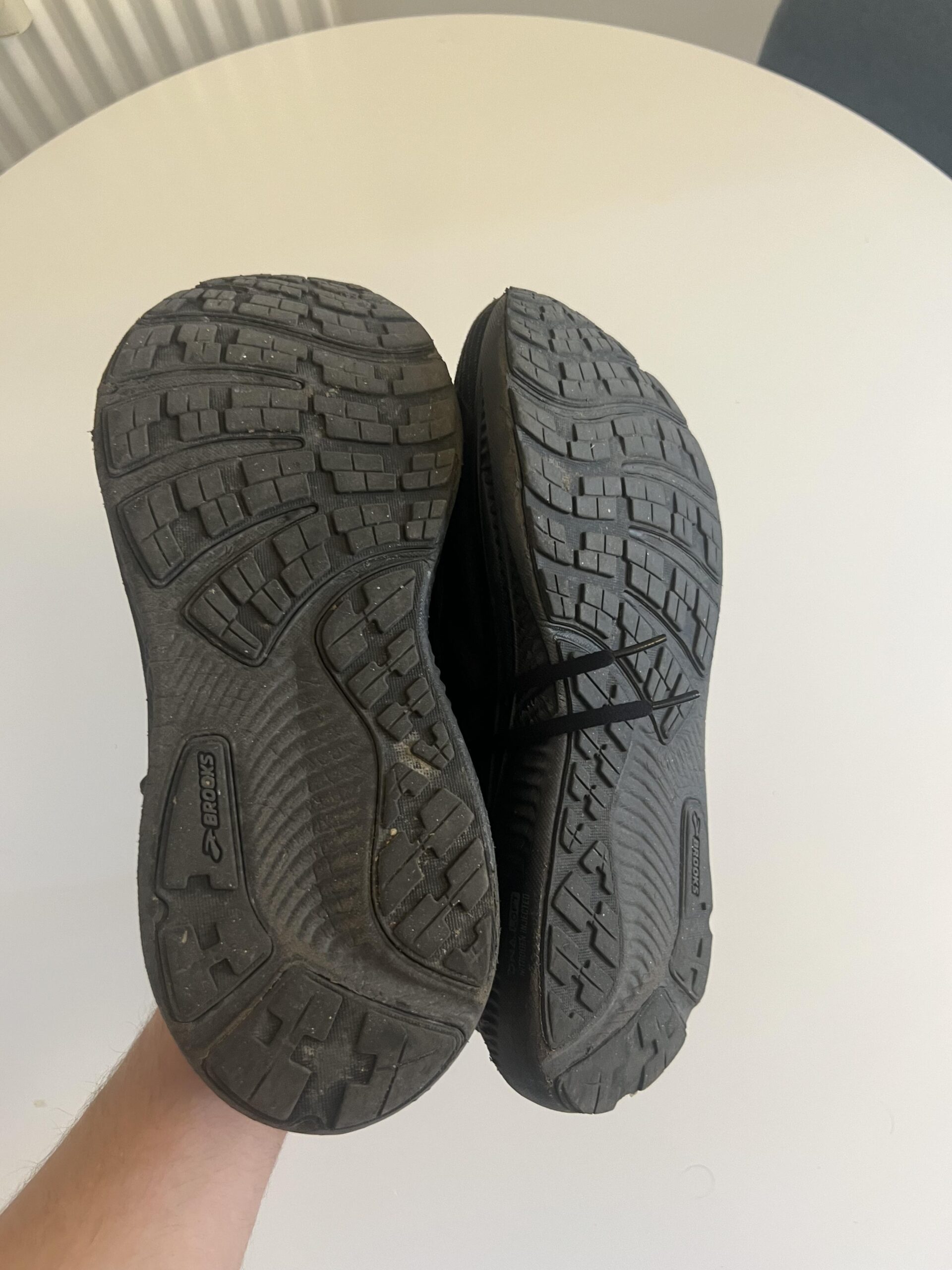 Outsole of a used Brooks Ghost 17 GTX shoe showing tread wear after several months of everyday use