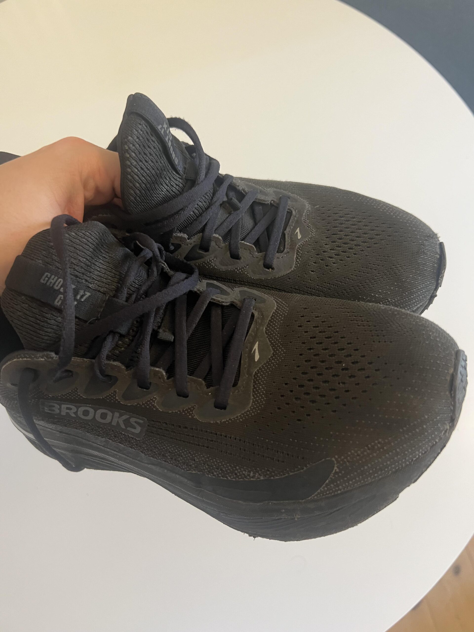 Black Brooks Ghost 17 GTX shoes showing the upper, laces and toe box