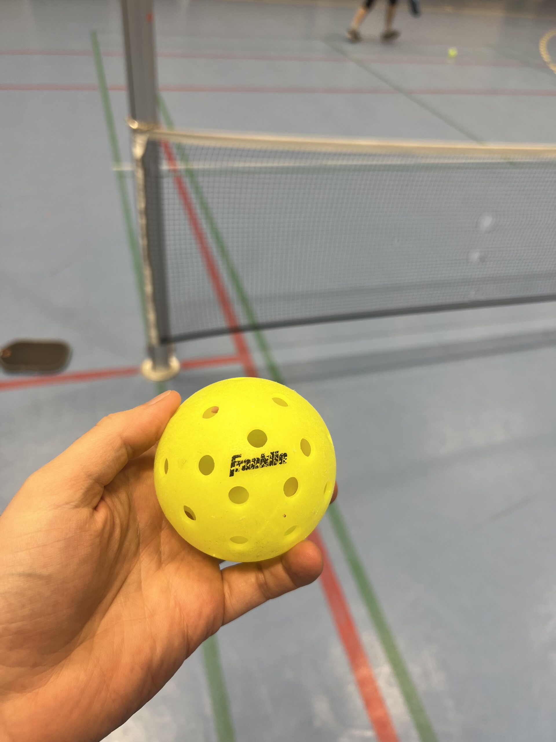 Franklin X-40 optic yellow pickleballs from my 36-pack after about 40 hours of use