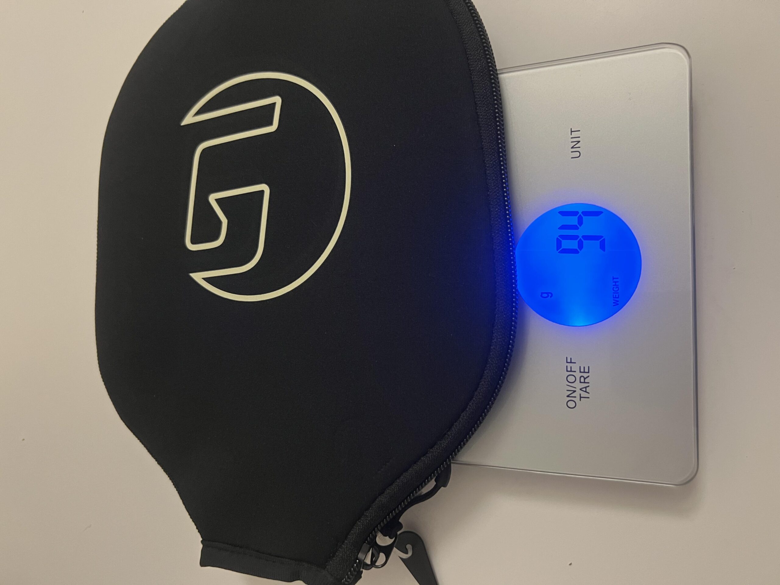 GAMMA cover on digital scale displaying 94 grams