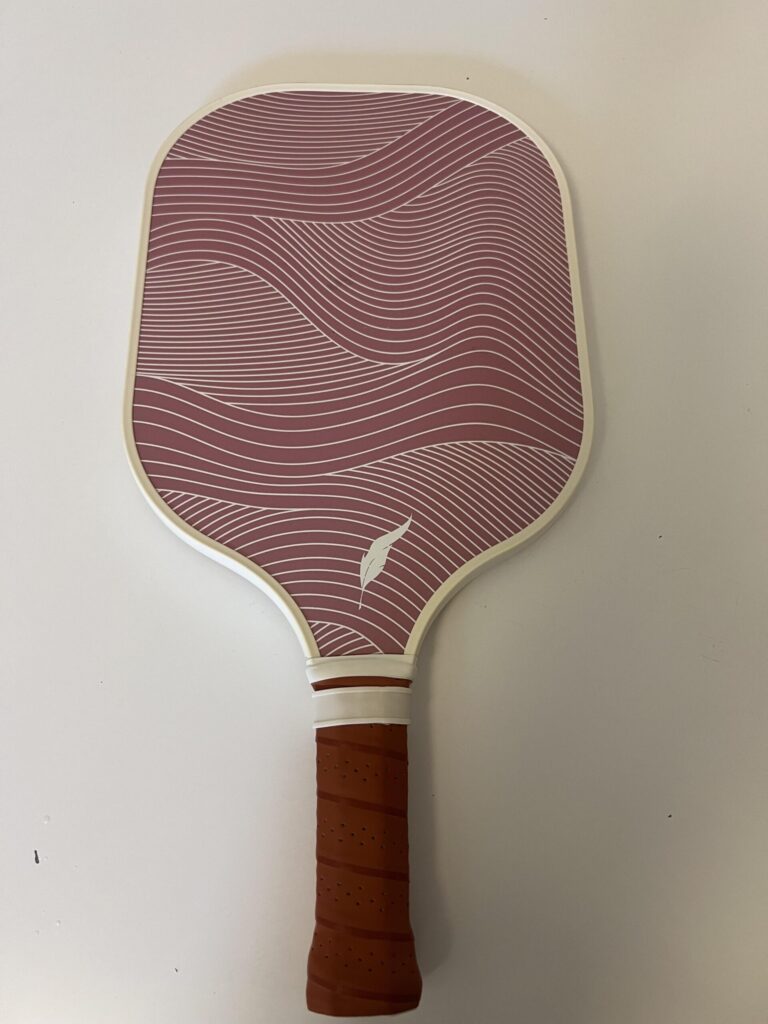 Used rose pink Inscribe pickleball paddle after personal testing and sporadic club use