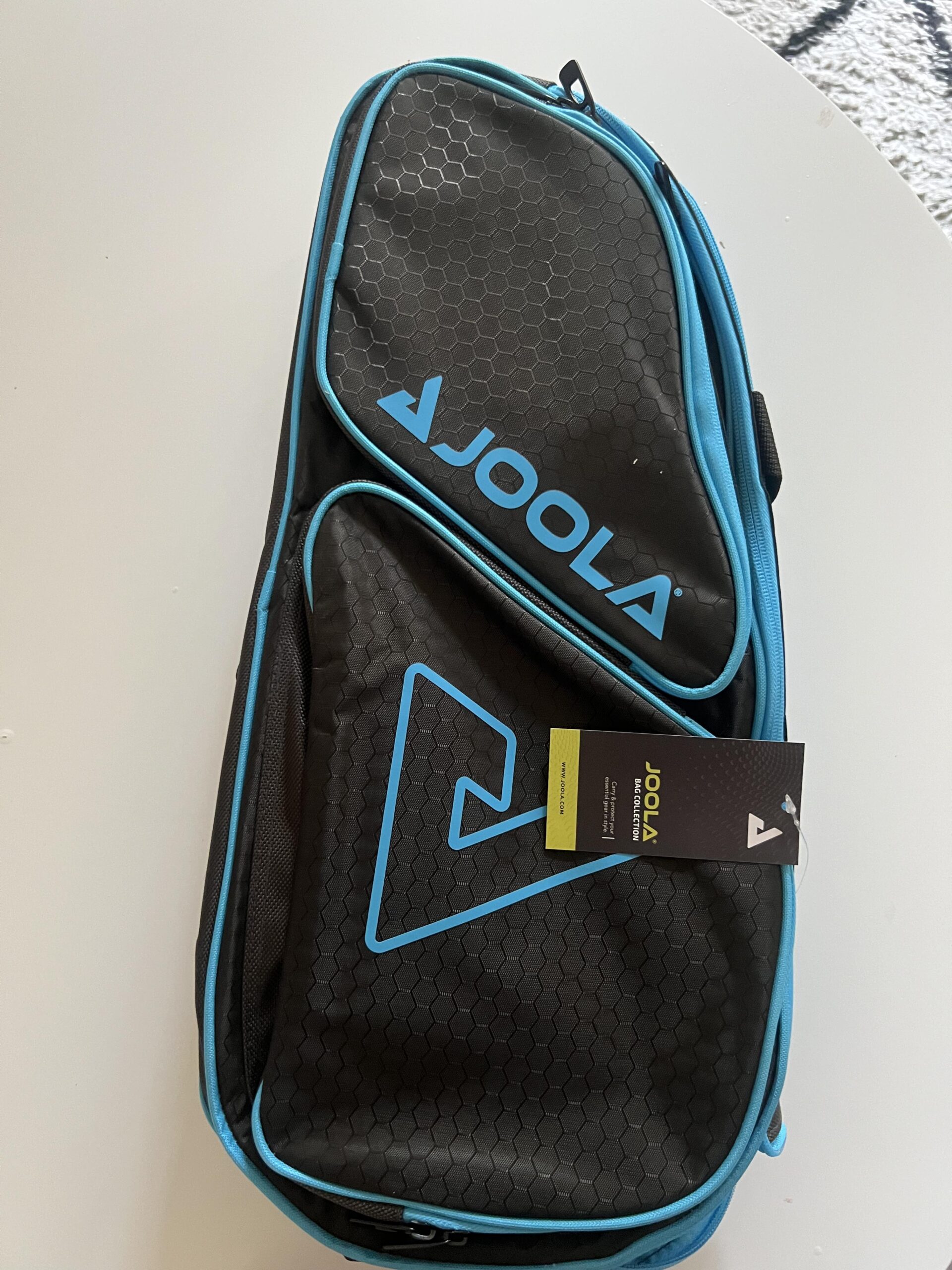 Black back panel with shoulder straps of JOOLA Tour Elite bag