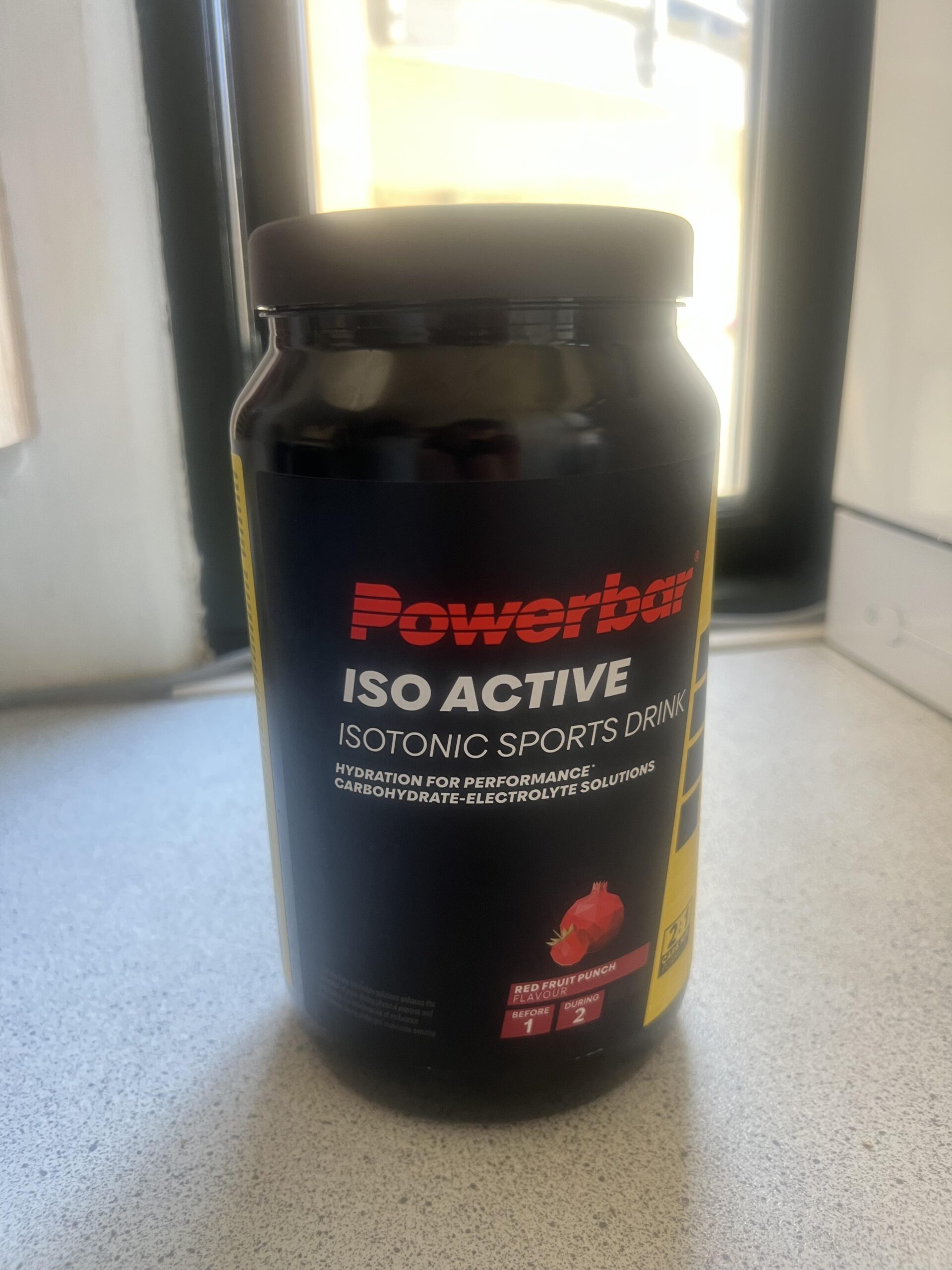 PowerBar Isoactive Red Fruit 1320g container from my pickleball test