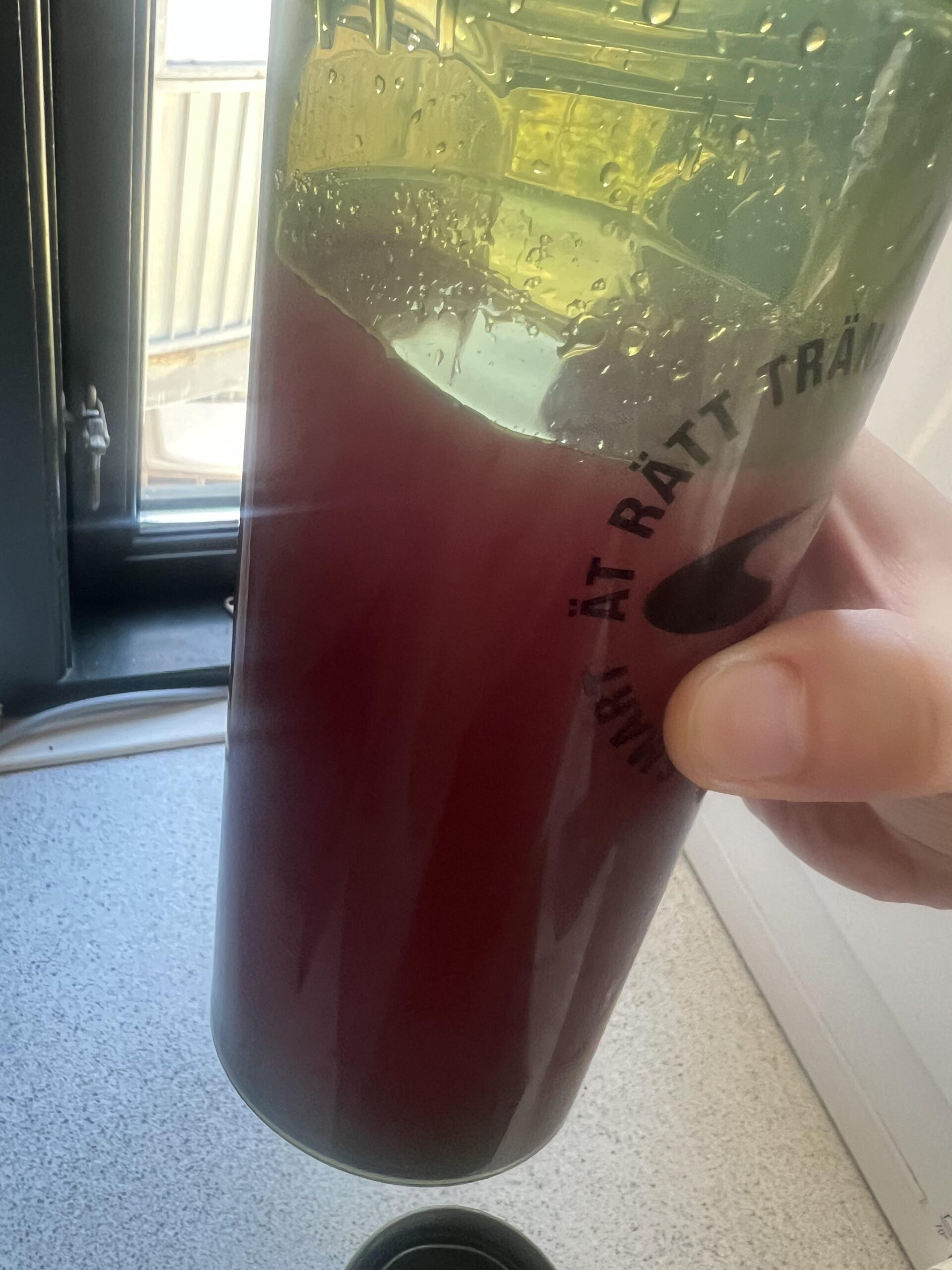 Mixed PowerBar Isoactive Red Fruit drink prepared for pickleball