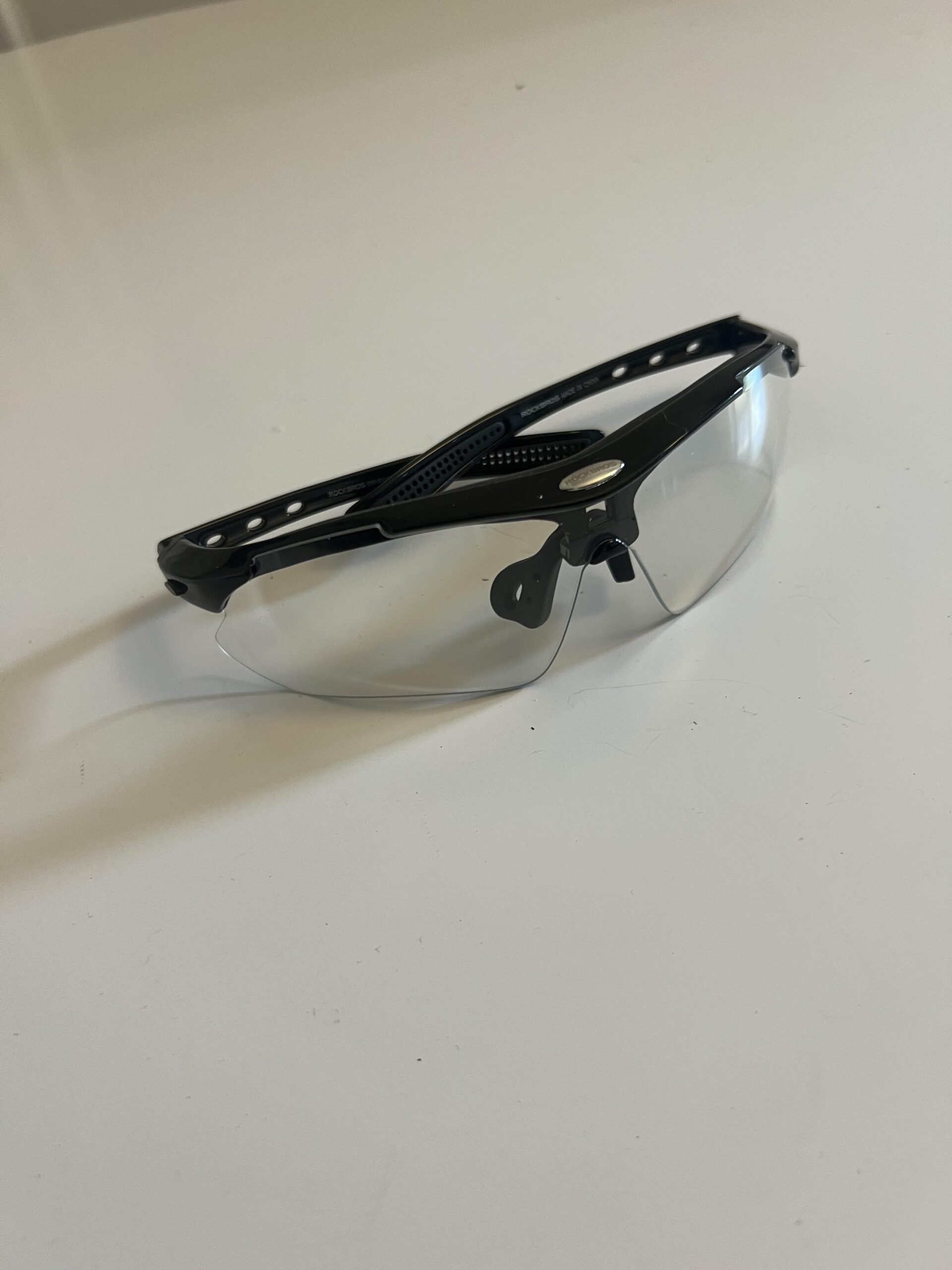 ROCKBROS photochromic pickleball glasses side profile with clear lens and temple arms